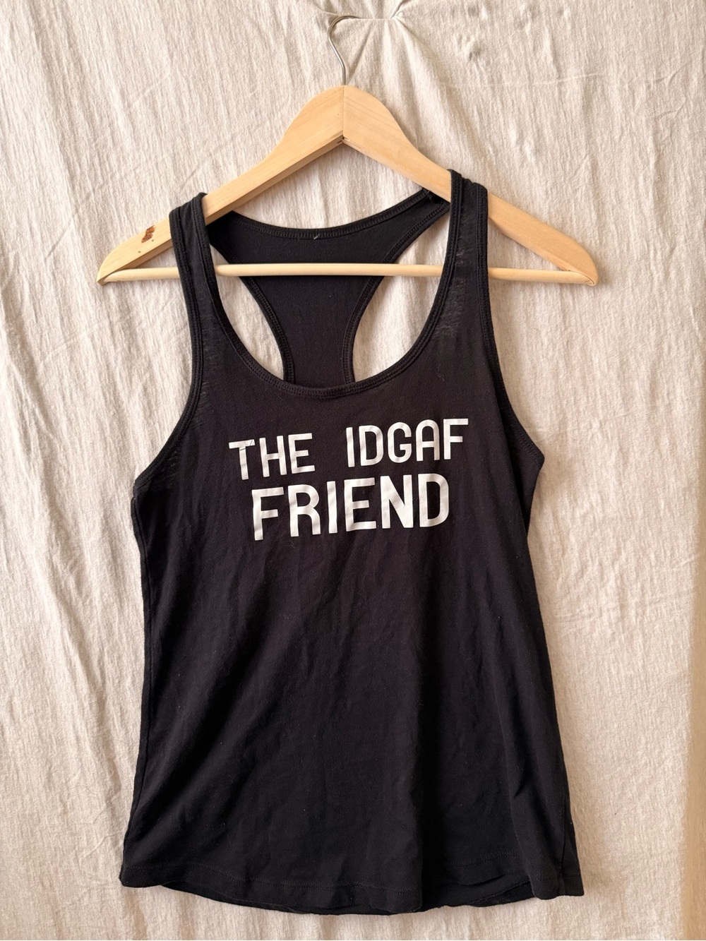 Black Racerback Tank Top — "The IDGAF Friend" Graphic
